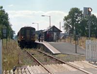 A single car north (or east) bound train calls at Llangadog. Seen from the level crossing.<br><br>[Ewan Crawford //2002]