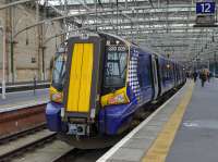 380 008 at Glasgow Central platform 12 with a stopping service to Gourock.<br><br>[Bill Roberton 18/03/2016]