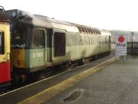 BR Sulzer Type 2 D7628 waits in the Network Rail platform, normally used by Northern Rail services, at Whitby Town station ready to lead the second, early afternoon, 'Santa Special' to Glaisdale on 13 December 2015. BR Standard 76079 was connected at the rear to provide extra propulsion and steam heating, also to head the return working back to Whitby. There are no Sunday workings to Whitby during the winter period, which allowed 'Santa Special' workings to operate to Glaisdale on three weekends.  <br><br>[David Pesterfield 13/12/2015]