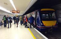 A slickly executed 4 minute crew changeover takes place for the 22:18 service to Edinburgh Waverley via Falkirk High.<br><br>[Colin McDonald 31/03/2016]