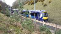 A six car train passing through Kelvindale.<br><br>[Rod Crawford 02/04/2016]