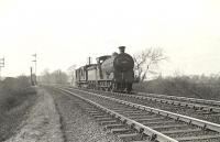 J37 0-6-0 64472 passing Dumbarton East Junction in April 1958 with two brake vans.  <br><br>[G H Robin collection by courtesy of the Mitchell Library, Glasgow 12/04/1958]