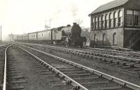 Parkhead V3 2-6-2T 67678 passing Dumbarton East Junction signal box on 12 April 1958 with a Balloch - Bridgeton service. After electrification 67678 was one of a number of V3s moved south to end their careers on Tyneside [see image 28426] <br><br>[G H Robin collection by courtesy of the Mitchell Library, Glasgow 12/04/1958]