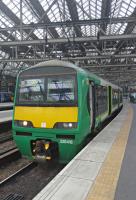 320416, in London Midland livery, leading the 1450 to Lanark. The former 4 car sets 321411-7 are being reduced to 3 cars and renumbered 320411-7 (where will the removed coaches go?). This is needed because 4 + 3 cars would have been too long for many ScotRail platforms. 380s thus released will be available for the E&G pending arrival of 385s.<br><br>[John Yellowlees 07/04/2016]