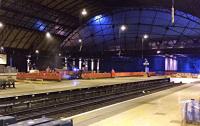 A platform level view of the start of demolition work for platform realignment at Glasgow Queen Street. There's now an 8ft hoarding blocking this view.<br><br>[Colin McDonald 31/03/2016]