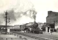 The 10.15am to Inverness leaves Buchanan Street on 11 July 1955 behind B1 4-6-0 61180.<br><br>[G H Robin collection by courtesy of the Mitchell Library, Glasgow 11/07/1955]