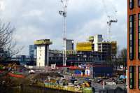 The final nail in the coffin - this edifice has now sprung up right across the trackbed. The bridge in the left background carries the lines from Central and Queen Street Low Level stations to the new Partick Interchange.<br><br>[Colin Miller 03/04/2016]