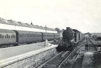 N2 0-6-2T 69595 arriving at Milngavie on 2 July 1957 with a train from Bridgeton Central.<br><br>[G H Robin collection by courtesy of the Mitchell Library, Glasgow 02/07/1957]