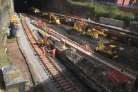 View of the works at Queen Street High level on the morning of 16th April 2016. Trackwork for platforms 1&2 has been replaced and platforms 3&4 are now receiving attention. The engineering train is on the platform 5 line.<br><br>[Colin McDonald 16/04/2016]