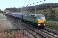 Two-tone green Brush Type 4 47830 <I>Beeching's Legacy</I> with a barrier coach and seven refurbished HST cars seen at Woodacre on 9th April 2016. The train, complete with <I>Rail Operators Group</I> headboard, was a working from Kilmarnock Works to Laira Depot. <br><br>[Mark Bartlett 09/04/2016]