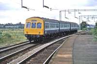 A Class 101 DMU passes through Wivenhoe station on 23rd August 1981. The train was a “Seaside Special” that had visited Clacton and Walton (where it had been stabled for the day). Chartered by the Fakenham and Dereham Railway Society, it is seen here returning home to stations between Wymondham and Ryburgh in Norfolk. [Ref query 4089]<br><br>[Mark Dufton 23/08/1981]