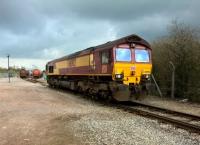 66.002 does its best impression of a guard dog as it sits in the throat of the Murco oil depot at Coundon Road. [see image 50675] View looks North. Notice that the train has been divided to facilitate unloading.<br><br>[Ken Strachan 08/04/2016]