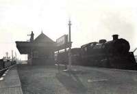 Motherwell based Standard Mogul 76000, recently arrived at Whifflet Upper station on 1 August 1961 at the head of a train from Maryhill Central.<br><br>[G H Robin collection by courtesy of the Mitchell Library, Glasgow 01/08/1961]