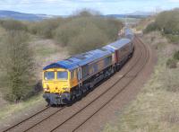 GBRf now provides haulage for the Royal Scotsman.  Appropriately-liveried 66746 leads the train past the former Lumphinnans Central Junction with the first 'Classic' tour of the year.  66736 brings up the rear.<br><br>[Bill Roberton 18/04/2016]