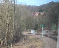 Grab shot from a Pacer negotiating the new Todmorden Curve and about to climb to Copy Pit summit on its way to Burnley and Blackburn from Manchester Victoria. The chord was relaid and opened to trains in May 2015 after a long campaign by East Lancashire local authorities. [See image 46768]<br><br>[Mark Bartlett 14/03/2016]