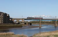 45690 <I>Leander</I> crosses Carlisle Bridge at Lancaster running from Carnforth to Preston to take over <I>The Salopian</I>, an excursion from Dumfries to Shrewsbury on 22nd April 2016.  <br><br>[Mark Bartlett 22/04/2016]