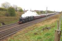 One of Ian Riley's Black 5s, 44871 approaches Farington Curve Jct on Day 3 of the Great Britain IX tour whilst working from Bristol to Grange-over-Sands. Unfortunately the weather was not behaving itself however at least the train was on the Down Fast making it a little easier to photograph.<br><br>[John McIntyre 28/04/2016]