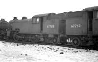 A pair of Thompson L1 2-6-4 tanks, nos 67780 and 67787, both built by Robert Stephenson and Hawthorn, Darlington and both eventually withdrawn by BR from Colwick shed at the end of 1962. The locomotives are seen here in the disposal siding alongside Darlington shed in early 1963 awaiting transfer to the nearby works scrapyard for cutting up. <br><br>[K A Gray //1963]