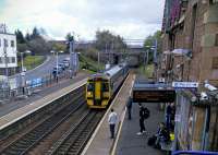 A rather full train from Edinburgh to Glasgow via Shotts is about to get even fuller at its last calling point, Uddingston, on 30/04/2016.<br><br>[David Panton 30/04/2016]