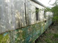 View along a grounded railway carriage near the former Burton Salmon station. <br><br>[David Pesterfield 14/04/2016]