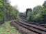This is one of a series of 'record' photographs taken of the South Suburban line in 2002 before major track renewal works.<br>
<br>
The location is about 300 yards to the east of the access point off Cluny Avenue in Morningside. On the left of the picture over the fence is the Jordan Burn. OB13 Oswald Road is visible in the background with signal ES670R adjacent. Blackford Hill itself is visible in the background through the trees above the bridge.<br><br>[Charlie Niven 25/04/2002]
