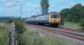 A 311 heads south past the original junction for the Burnbrae goods branch in 1988.<br><br>[Ewan Crawford //]