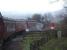 First impressions can be misleading, with BR Standard 76079 appearing to be powering a rake of coaches round a curve. However the smoke tells the truth, being forward of the chimney, as the loco is in fact providing additional propulsion on the rear of a 'Santa Special' being hauled by BR Sulzer D7628 as it approaches Grosmont en route to Glaisdale on Sunday 13 December 2015. The Standard hauled the return working back to Whitby, plus provided ample steam heating to the carriages.<br><br>[David Pesterfield 13/12/2015]