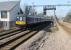 Northern Electric 319363 leaves Huyton heading for Lime Street on a service from Warrington Bank Quay. The next stop at Roby, a very short distance away, can also be seen. Huyton has changed significantly in just a few years with electrification and additional tracks. [See image 40738] for a similar view in 2012. <br><br>[Mark Bartlett 14/03/2016]
