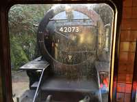 Fairbairn tank 42073 prepares to de-couple from its train after arrival at Haverthwaite from Lakeside  before reversing to take on water and run around.<br><br>[Martin MacGuire 10/04/2016]