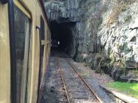 Fairbairn tank 42073 reverses to the crossover points in the short tunnel at the South end of Haverthwaite station before moving to the front of the next train to Lakeside.<br><br>[Martin MacGuire 10/04/2016]