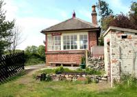 The signal box at the south end of the platform at Warcop station, photographed in May 2006.<br><br>[John Furnevel 11/05/2006]