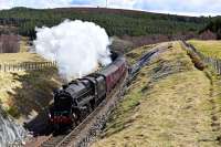 Black 5 No.44871 starts the climb to Slochd Summit with The Great Britain IX .Once over the summit it's almost all downhill to Inverness.<br><br>[John Gray 30/04/2016]