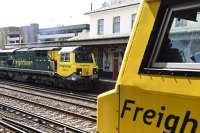 Freightliner 70013 & 70014 stopped for crew changes<br>
<br>
No doubt there is an operational  reason why the crew changes take place mid platform and not at the platform stop signal, some of these freights seem to be a mile long and tailing back down the railway.<br><br>[Peter Todd 05/05/2016]