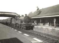 A train from Kilmarnock arrives at Prestwick on 6 August 1955 behind 2P 4-4-0 40610. <br><br>[G H Robin collection by courtesy of the Mitchell Library, Glasgow 06/08/1955]