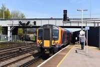 450-039 slowly scraping past a stopped Freightliner. These 12 car trains are pretty impressive as they negotiate the points/curves.<br><br>[Peter Todd 05/05/2016]