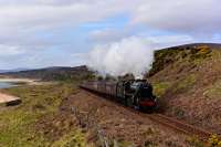 North of Brora, The Far North Line runs along the east coast until it reaches Helmsdale then turns inland to follow the Strath of Kildonan. Black 5 No. 44871 is pictured near Loth, between Brora and Helmsdale, with The Great Britain IX.<br><br>[John Gray 01/05/2016]