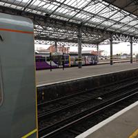 Southport still boasts a fine glazed trainshed and six platforms. Three trains await departure in April 2016.<br><br>[Veronica Clibbery /04/2016]