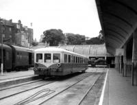 A railcar waits in the platform at the terminus of Granville in northern France in July 1966.<br><br>[John McIntyre /07/1966]