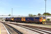 GBRf trio 66757, 73212 and 73213 stabled in the sidings alongside Eastleigh station on 5 May 2016.<br><br>[Peter Todd 05/05/2016]