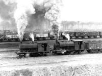 A loaded coal train sets out from the sidings at Polkemmet Colliery on 11 February 1972 behind a pair of NCB pugs. The coal is destined for the BR exchange sidings on Polkemmet Moor.<br><br>[John Furnevel 11/02/1972]