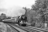 'Tornado' on the GWR Berks and Hants line, just to the west of Great Bedwyn Station.<br><br>
<br><br>
The train is heading west to Westbury and then onto Bath and Bristol.<br><br>[Peter Todd 11/05/2016]