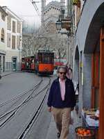 The Tram de Soller links Soller with its port. Same gauge as the Tren de Soller but no through running. Here in the centre of Soller with its magnificent church in the background.<br><br>[John Thorn 17/02/2001]
