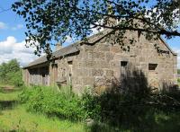 Looking to Boat of Garten showing the eastbound station building at Grantown-on-Spey East.<br><br>[Clive Meredith /06/2015]