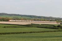 Considerable weekend engineering work has taken place during Spring 2016 repairing the long low embankment to the north of Carnforth station. An 11 coach Pendolino heads north over the pristine structure on the evening of 12th May 2016. <br><br>[Mark Bartlett 12/05/2016]