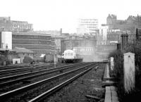 A westbound commuter service restarting from Haymarket in September 1979. The DMU is about to pass Haymarket coal depot after leaving a blue haze over Haymarket East Junction.<br><br>[John Furnevel 17/09/1979]