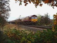 66205 (TO) at Kay Park Junction south of Kilmarnock with a loaded MGR<br>
from Knockshinnoch-Falkland Yard.<br><br>[Colin Howat 01/11/2004]