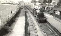 V1 67614 arrives at Westerton on 1 August 1957 with a Helensburgh - Bridgeton train. <br><br>[G H Robin collection by courtesy of the Mitchell Library, Glasgow //]