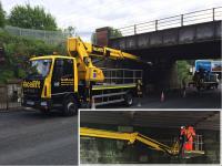 The bridge which carries the Shettleston Loop as well as the line to Airdrie (and now through to Edinburgh) over Gartocher Road  receives a thorough inspection over several days in May 2016. A second and now disused bridge which carried the Glasgow, Bothwell, Hamilton and Coatbridge Railway over the road is still in place just beyond the advertisment hoardings to the right.<br><br>[Colin McDonald 25/05/2016]