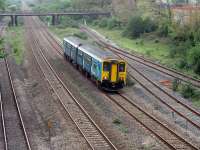 150 passing the site of Margam Halt with a Newport to Fishguard Harbour train.<br><br>[Alastair McLellan 19/05/2016]