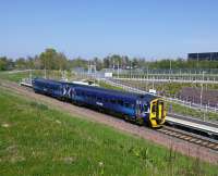 A Tweedbank service pulls into Eskbank on 10/05/2016. A belting day, a smell of blossom in the air and only a few minutes walk from a Costa Belgian chocolate brownie. Other coffee shops and cakes are available. But they're not as good.<br><br>[David Panton 10/05/2016]